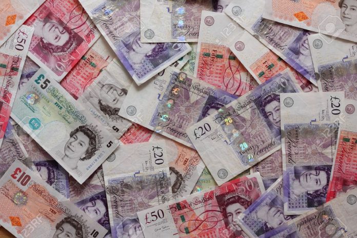 21426670-Mix-of-british-pound-sterling-banknotes-Stock-Photo-pounds